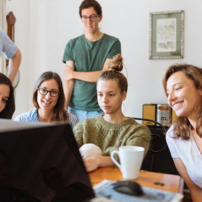 People Looking at Laptop Computer