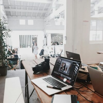 Turned-on Gray Laptop Computer on Table